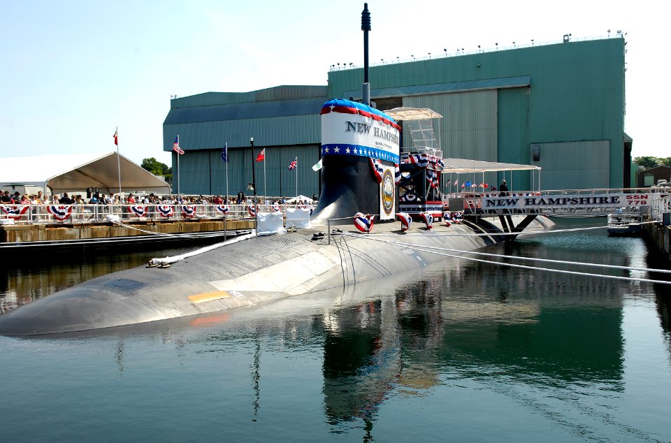 US Navy 080621-N-8467N-001 Pre-commissioning Unit New Hampshire (SSN 778) sits moored to the pier at General Dynamics Electric Boat shipyard moments before her christening ceremony commenced