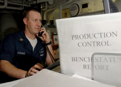US Navy 080619-N-1281H-096 Aviation Support Equipment Technician 1st Class Jamey Atkins screens induction maintenance action forms on a computer aboard the Nimitz-class aircraft carrier USS Abraham Lincoln (CVN 72)