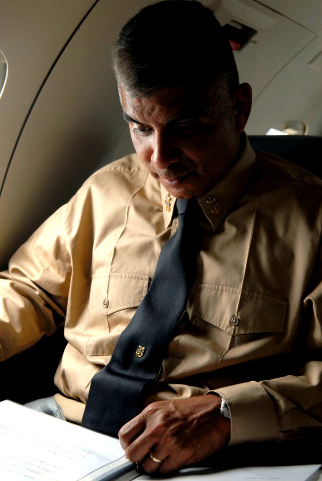 US Navy 080623-N-9818V-178 Master Chief Petty Officer of the Navy (MCPON) Joe R. Campa Jr. works during a flight back to Andrews Air Force after visiting Naval Support Activity Mid-South, Millington