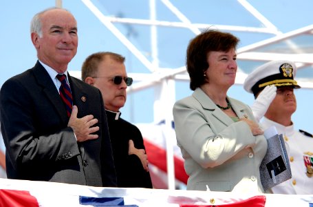 US Navy 080621-N-8467N-010 The Honorable Joseph Courtney, left, United States Representative from Connecticut, and The Honorable Carol Shea-Porter, United States Representative from New Hampshire, render honor to the National A