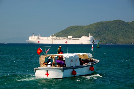US Navy 080620-N-7498L-235 A motor whale-boat from the Military Sealift Command hospital ship USNS Mercy (T-AH 19) transports a group of Vietnamese military distinguished visitors for a tour aboard the ship