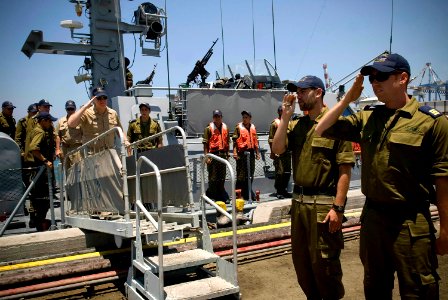 US Navy 080623-N-8273J-303 Chief of Naval Operations (CNO) Adm. Gary Roughead is piped ashore by members of the Israel Navy after getting underway on an Israel Navy Shaldag Mk-II class Fast Patrol Boat