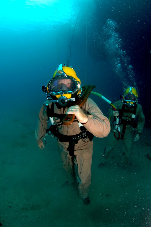 USN diver walks across the seabed