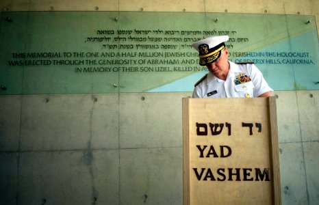 US Navy 080624-N-8273J-109 Chief of Naval Operations (CNO) Adm. Gary Roughead signs the guest book after visiting the Yad Vashem Holocaust Museum in Jerusalem, Israel photo