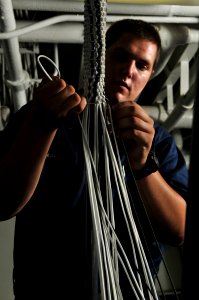 US Navy 080625-N-7981E-131 Seaman Bo Parker puts braided photo