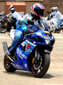 US Navy 080627-N-4965F-422 Air Force Master Sgt. Dishon Gregory, assigned to Hickam Air Force Base, Hawaii, participates in a cornering exercise during a Military Sport Bike Rider Course