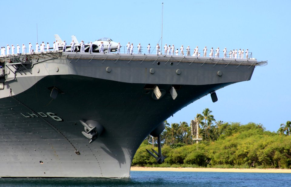 US Navy 080627-N-0879R-003 Sailors man the rails as the amphibious assault ship USS Bonhomme Richard (LHD 6) pulls into Naval Station Pearl Harbor for a scheduled port call before starting Rim of the Pacific (RIMPAC) 2008