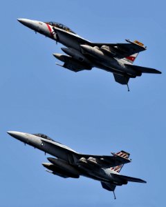 US Navy 080627-N-7981E-185 Two F-A-18E-F Super Hornets fly over Abraham Lincoln