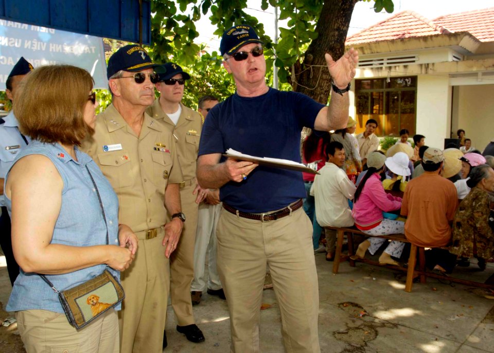 US Navy 080627-N-0209M-004 Capt. Terrance C. Leary, right, briefs Vice Adm. Doug Crowder, commander, U.S. 7th Fleet, during a tour of the medical civic action program site