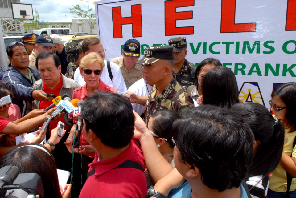 US Navy 080629-N-0640K-178 U.S. Ambassador to the Philippines, Kristie A. Kenney, speaks with members from the Philippine media
