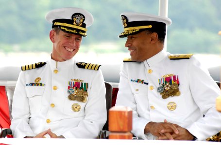 US Navy 080627-N-8467N-001 Rear Adm. Bruce E. Grooms, commander, Submarine Group 2, and Capt. Richard P. Breckenridge, commander, Submarine Squadron 4, share a laugh