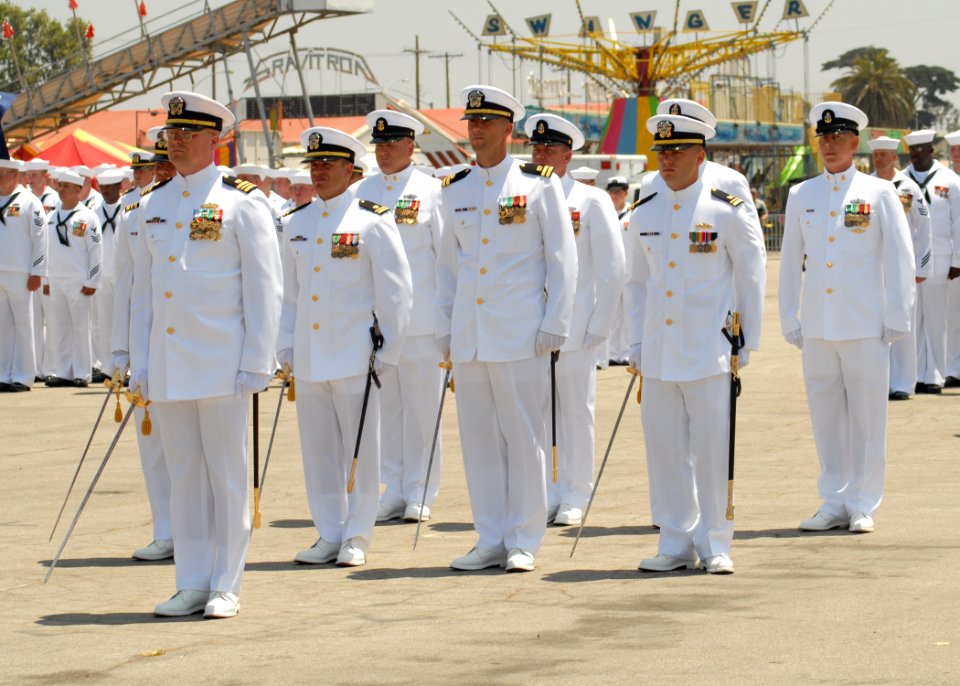 US Navy 080628-N-3560G-245 ailors assigned to Naval Mobile Construction Battalion (NMCB) 4 form up preparing to march in a parade during the opening ceremonies of Seabee Days