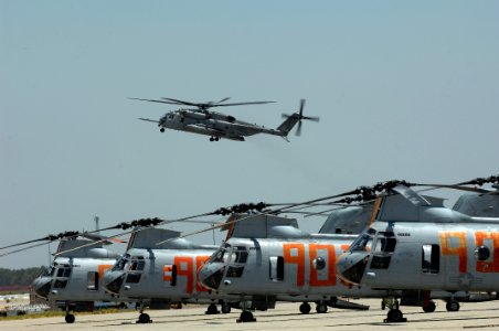 US Navy 080630-F-1689G-020 A helicopter assigned to Heavy Marine Helicopter Squadron (HMH) 465 arrives at Naval Air Station (NAS) Lemoore as CH-46 Sea Knight helicopters stand ready to conduct firefighting support operations in photo