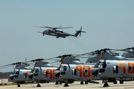 US Navy 080630-F-1689G-020 A helicopter assigned to Heavy Marine Helicopter Squadron (HMH) 465 arrives at Naval Air Station (NAS) Lemoore as CH-46 Sea Knight helicopters stand ready to conduct firefighting support operations in