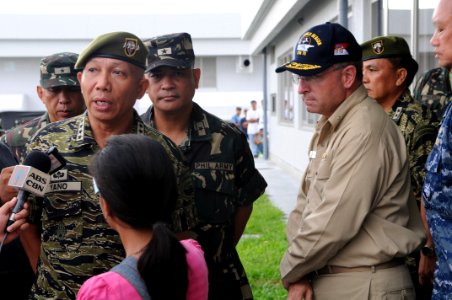 US Navy 080627-N-3659B-673 Gen. Alexander B. Yano, chief of staff, Armed Forces of the Philippines (AFP), discusses relief efforts with local media while Rear Adm. James P. Wisecup, commander, Carrier Strike Group (CSG) 7 looks