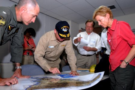 US Navy 080629-N-0640K-067 Commander Carrier Strike Group Seven, Rear Adm. James P. Wisecup, center shows U.S. Ambassador to the Philippines, Kristie A. Kenney, the areas in the Philippines where USS Ronald Reagan (CVN 76) has