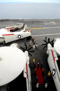US Navy 080629-N-4009P-288 Side boys render honors to U.S. Ambassador to the Republic of the Philippines Kristie Kenney aboard the aircraft carrier USS Ronald Reagan (CVN 76)