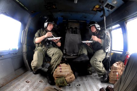 US Navy 080629-N-5961C-015 Air crews assigned to Helicopter Anti-Submarine Squadron (HS) 4 have been working long hours for five days delivering food and water to Panay Island, Republic of the Philippines in the wake of Typhoon