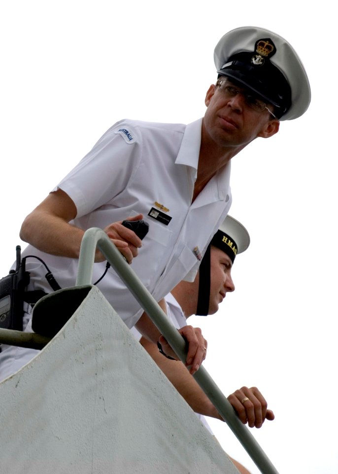 US Navy 080627-N-6674H-103 A Sailor aboard the Royal Australian Navy amphibious ship HMAS Tolbrook (LSH 50) stands watch as the ship moors pier-side at Naval Station Pearl Harbor for this year's Rim of the Pacific (RIMPAC) 2008