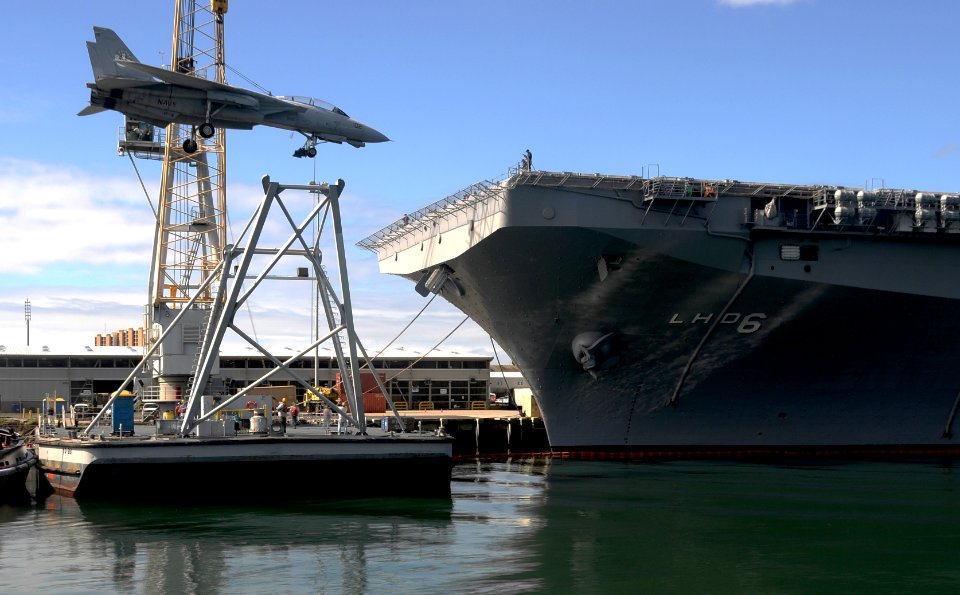 US Navy 080701-N-1722M-033 An F-14D is hoisted off of the amphibious assault ship USS Bonhomme Richard (LHD 6) after being transported from the USS Midway Museum in San Diego