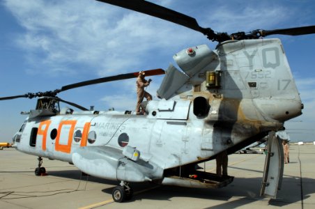 US Navy 080630-F-1689G-079 Lance Cpl. Corey Parker, assigned to Marine Medium Helicopter Squadron (HMM) 268, conducts a turn-around inspection of a CH-46 Sea Knight helicopter at Naval Air Station (NAS) Lemoore after a firefigh