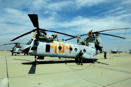 US Navy 080630-F-5735S-005 CH-53 Super Stallion helicopters assigned to Marine Heavy Helicopter Squadron (HMH) 465 from Marine Corps Air Station Miramar, Calif., arrive at Naval Air Station (NAS) Lemoore photo