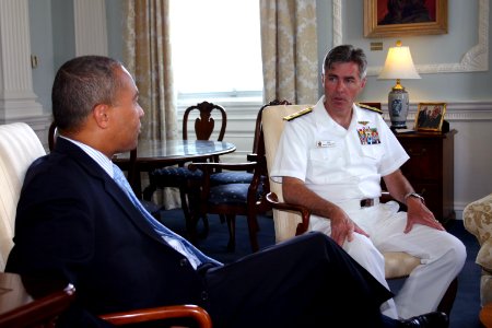 US Navy 080701-N-8110K-015 Massachusetts Governor Deval Patrick speaks with Rear Adm. Kenneth Braithwaite, vice chief of Information at the Massachusetts State House photo