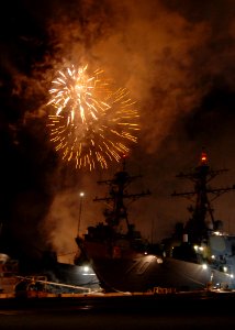 US Navy 080704-N-0641S-091 Fireworks illuminate the night sky aboard Naval Station Pearl Harbor during a 4th of July celebration photo