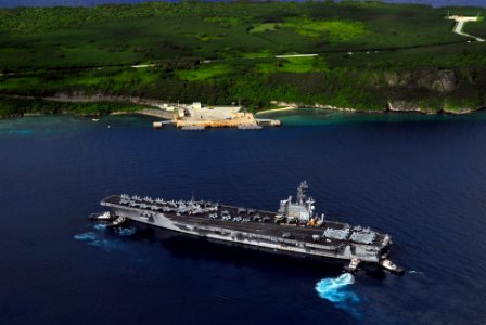 US Navy 080706-N-0640K-002 The Nimitz-class aircraft carrier USS Ronald Reagan (CVN 76) pulls into Agana Harbor off the coast of Guam. Ronald Reagan Sailors are on a scheduled port visit to the city