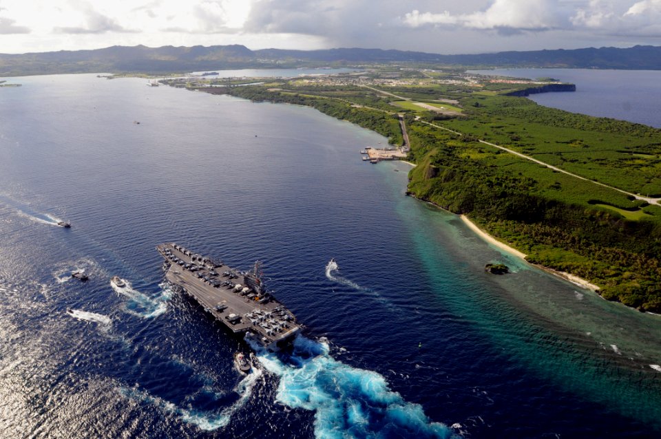 US Navy 080706-N-5961C-003 The Nimitz-class aircraft carrier USS Ronald Reagan (CVN 76) pulls into Agana Harbor off the coast of Guam. Ronald Reagan Sailors are on a scheduled port visit to the city