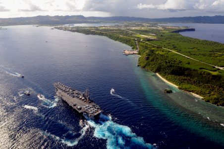 US Navy 080706-N-5961C-003 The Nimitz-class aircraft carrier USS Ronald Reagan (CVN 76) pulls into Agana Harbor off the coast of Guam. Ronald Reagan Sailors are on a scheduled port visit to the city