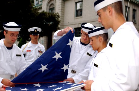 US Navy 080709-N-1134L-049 Plebes from the U.S. Naval Academy Class of 2012 practice folding the national ensign