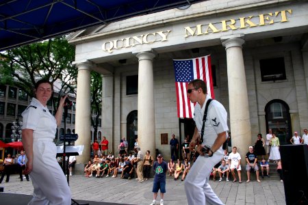 US Navy 080701-N-8110K-107 The lead guitarist of the Navy rock band, Rhode Island Sound, performs at the historic Quincy market in Boston