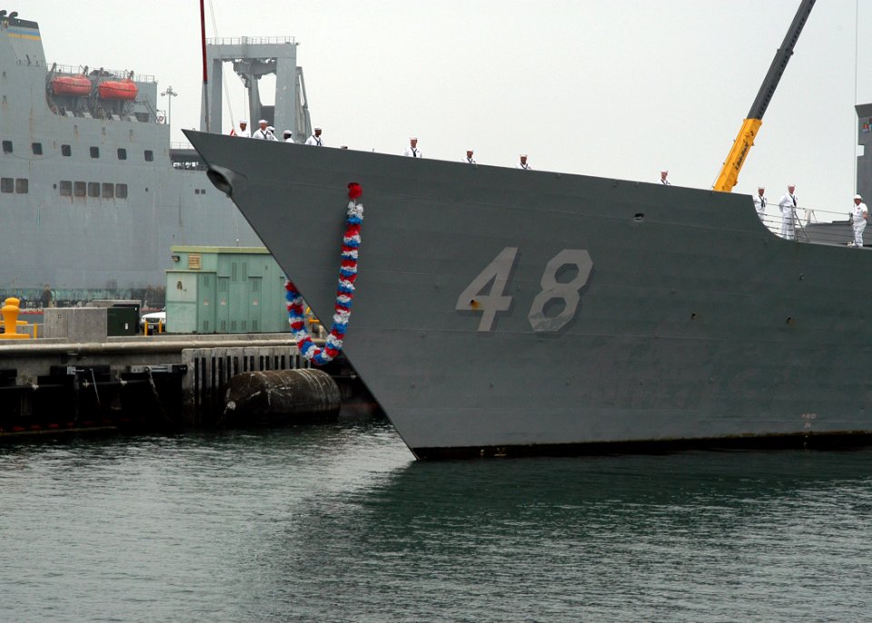 US Navy 080703-N-6410J-020 Sailors aboard the guided-missile frigate USS Vandegrift (FFG-48) man-the-rails while the ship approaches a pier at Naval Station San Diego
