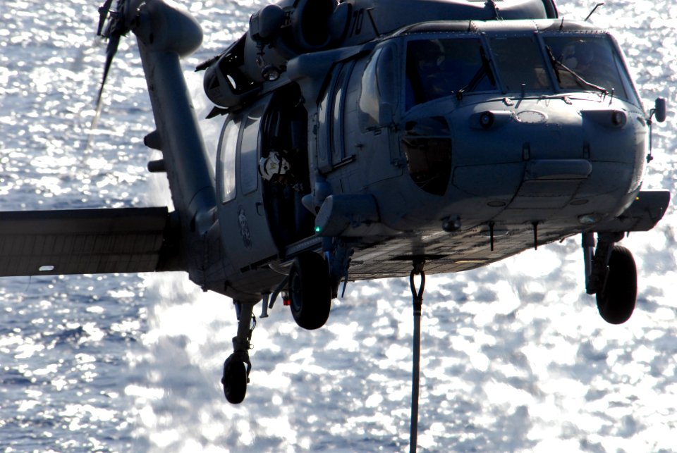 US Navy 080710-N-1635S-006 An aircrewman aboard an MH-60S Seahawk assigned to the