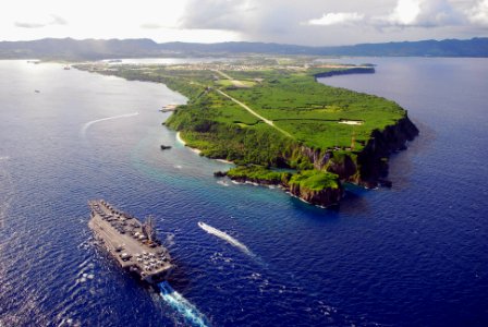 US Navy 080706-N-0640K-001 The Nimitz-class aircraft carrier USS Ronald Reagan (CVN 76) pulls into Agana Harbor off the coast of Guam photo