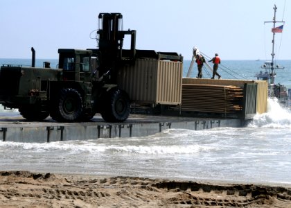 US Navy 080707-N-1424C-175 A Navy lighterage system causeway ferry is off loaded during Joint Logistics Over-The-Shore (JLOTS) 2008