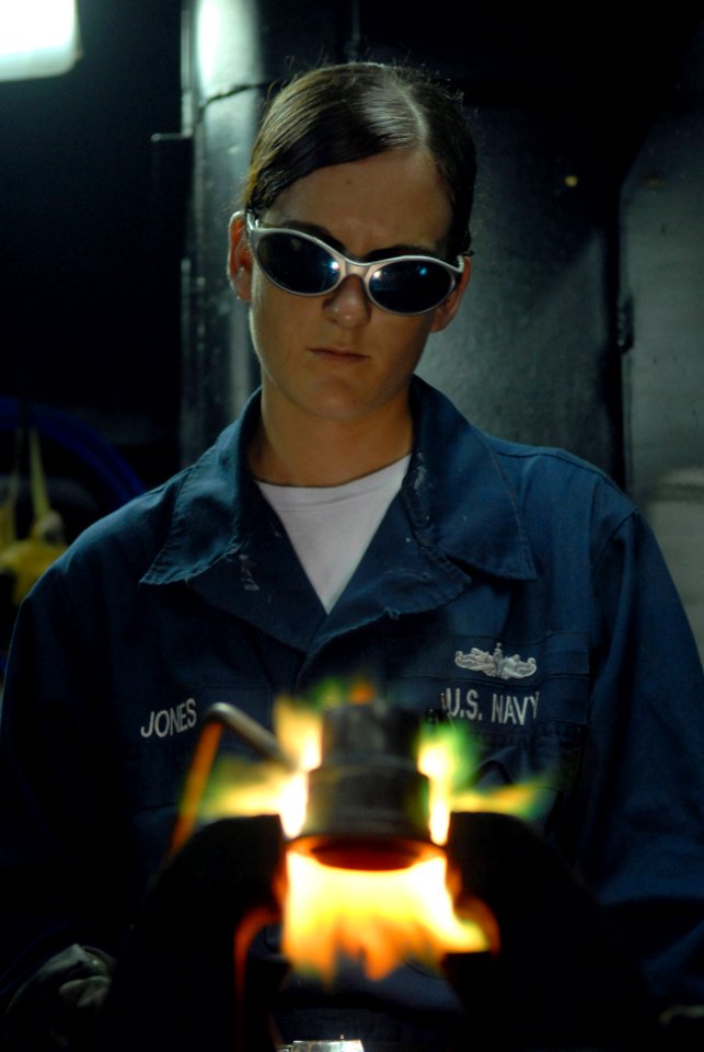 US Navy 080705-N-1635S-003 Hull Technician Fireman Donna Jones, from Mentone, Texas, performs a brazing job in the pipe shop aboard the Nimitz-class aircraft carrier USS Ronald Reagan (CVN 76)