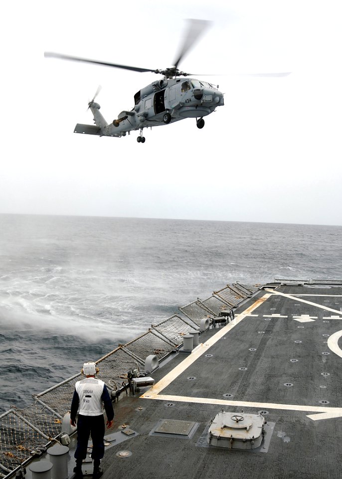 US Navy 080709-N-1082Z-059 Boatswain's Mate 1st Class Stephen Graham serves as flight deck safety observer