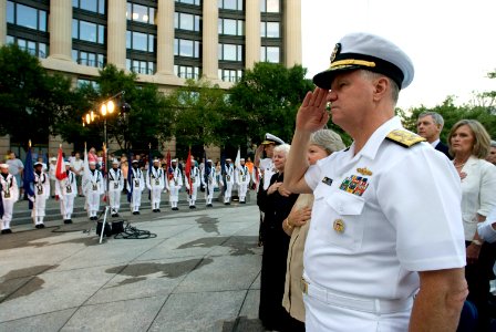 US Navy 080701-N-8273J-087 Chief of Naval Operations (CNO) Adm. Gary Roughead renders honors as Sailors assigned to the Navy Ceremonial Guard present the colors at the Navy District Washington Concert on the Avenue at the U.S photo