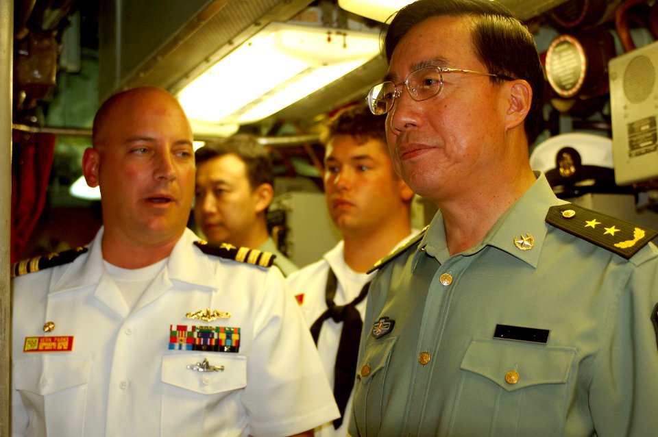 US Navy 080708-N-9486C-003 Lt. Gen. Zhang Qinsheng, commander of Guangzhou Military Region, China, tours the control room of the fast-attack submarine USS Santa Fe (SSN 763)