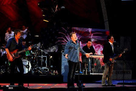US Navy 080704-N-4014G-411 Rascal Flatts performs in Boston's Esplanade during the 35th Annual Boston Pops Fireworks Spectacular. The Multi-purpose amphibious assault ship USS Bataan (LHD 5)