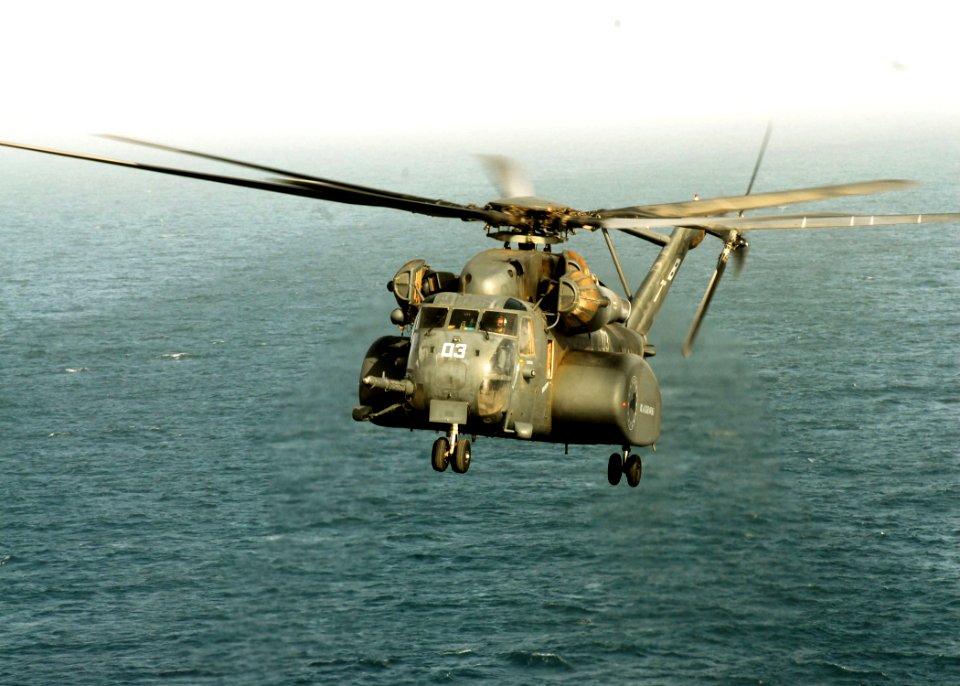 US Navy 080710-N-5148B-042 An MH-53E Sea Dragon assigned to Helicopter Mine Countermeasures Squadron (HM) 15 launches from the amphibious assault ship USS Peleliu (LHA 5)