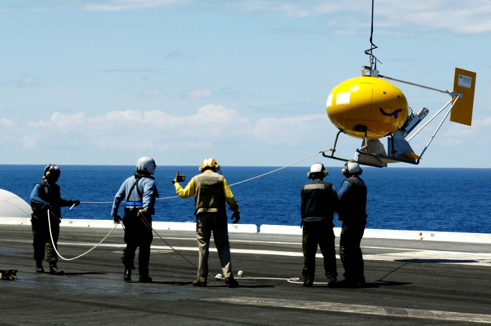 US Navy 080713-N-7883G-038 Sailors place a MK-53 Nulka Decoy Launching System on the flight deck of the aircraft carrier USS Kitty Hawk (CV 63)