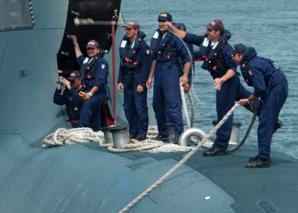 US Navy 080711-N-3285B-034 Crew members from the Italian air-independent propulsion (AIP) equipped submarine ITS Salvatore Todaro (S-526) prepare to pull into port