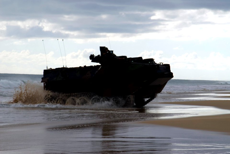 US Navy 080714-N-6674H-121 An armored assault vehicle assigned to Combat Assault Company (CAC), 3rd Marine Regiment, transports Indonesian Marines