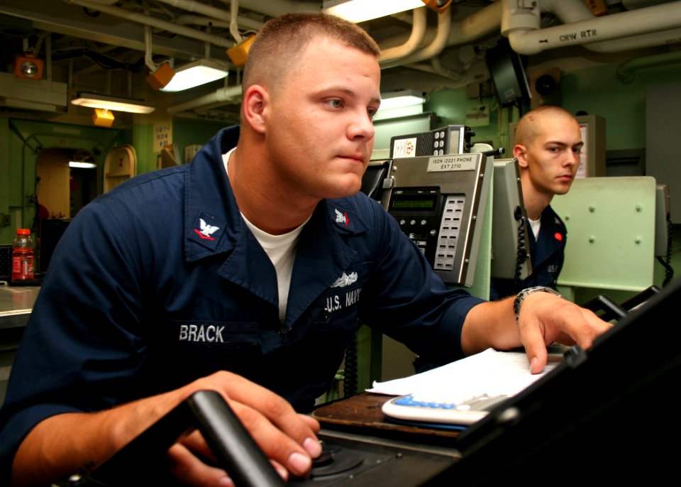 US Navy 080712-N-6764G-090 Damage Controlman 3rd Class Kaleb Brack monitors the damage control console in damage control central