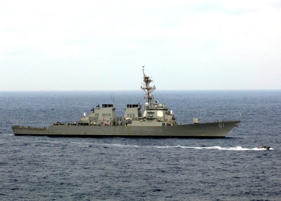 US Navy 080712-N-5681S-053 A rigid hull inflatable boat (RHIB) passes by the guided-missile destroyer USS Ramage (DDG 61) during the Iwo Jima Expeditionary Strike Group composite unit training exercise