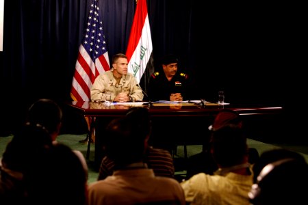 US Navy 080713-N-9623R-003 Rear Adm. Patrick Driscoll, left, spokesman for Multi-National Force-Iraq and Maj. General Abdul Karim Khalaf, spokesman for the Iraqi Ministry of Interior, answer questions during a press conference photo