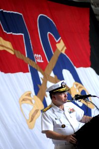 US Navy 080714-N-5961C-007 Rear Adm. Phil Wisecup, commander, Carrier Strike Group (CSG) 7, addresses the media in the hangar bay of the Nimitz-class aircraft carrier USS Ronald Reagan (CVN 76)